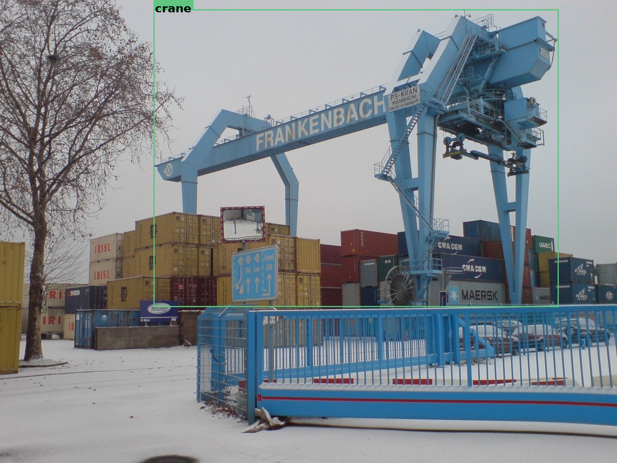 Container port scene with a single large crane structure detected